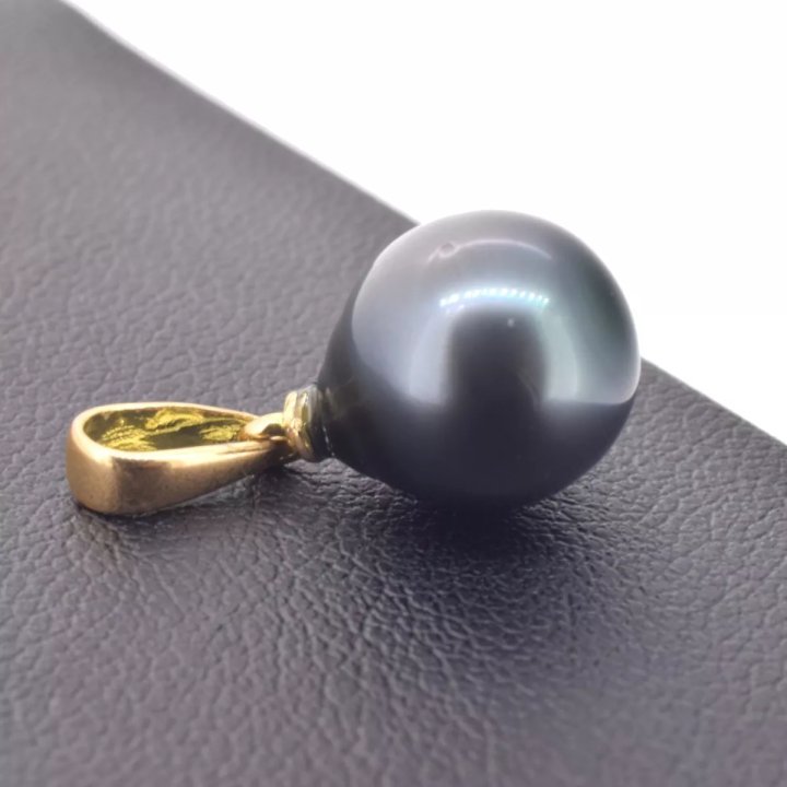 Colgante Vaena con perla de Tahití en forma de pera con anillos
