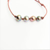 Bracelets coton 4 perles de Tahiti cerclées Mamiti