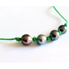 Waxed cotton bracelet with 4  Tahitian pearls