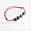 Waxed cotton bracelet with 4  Tahitian pearls