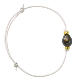 Cotton and gold bracelet with a Tahitian pearl