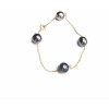 Bracelet or 18k perles de Tahiti cerclées Capucine