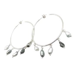 Pia sterling silver hoop earrings with five Tahitian keshi pearls on each hoop, front view on white background
